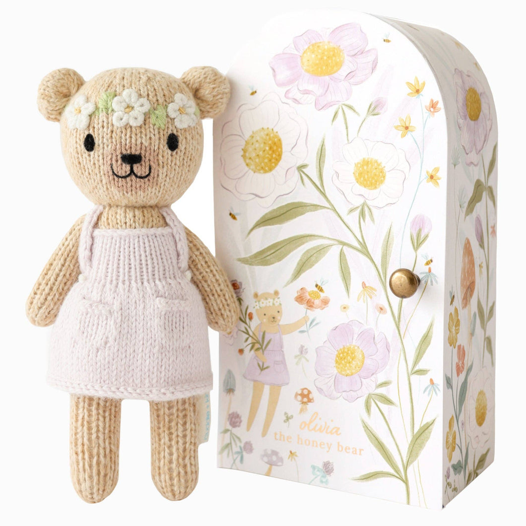 Tiny Olivia the honey bear, gives 10 meals